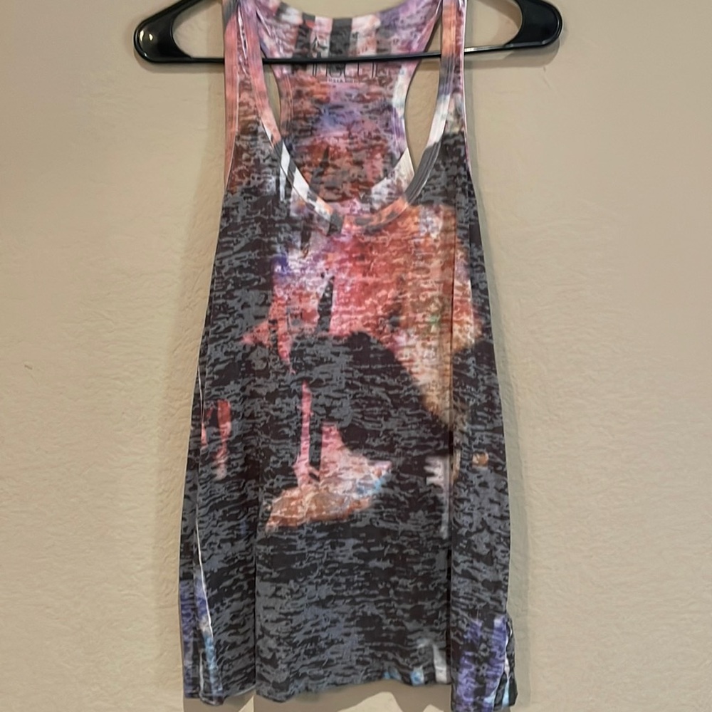 This is a multicolored nollie tank top size is large